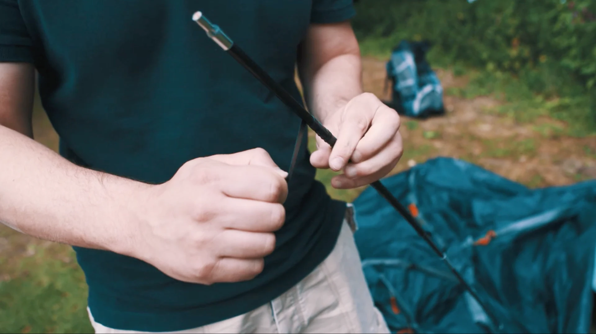 Taping up the tent pole