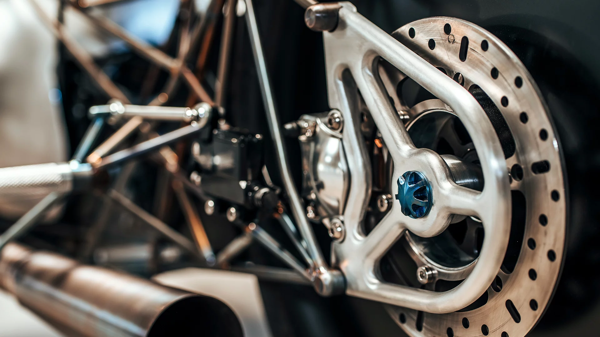 Rear brake and rigidly mounted axle