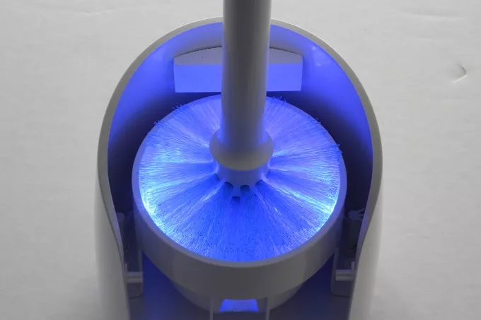 UV lights from all sides blast and sanitize the Lumi toilet brush after use