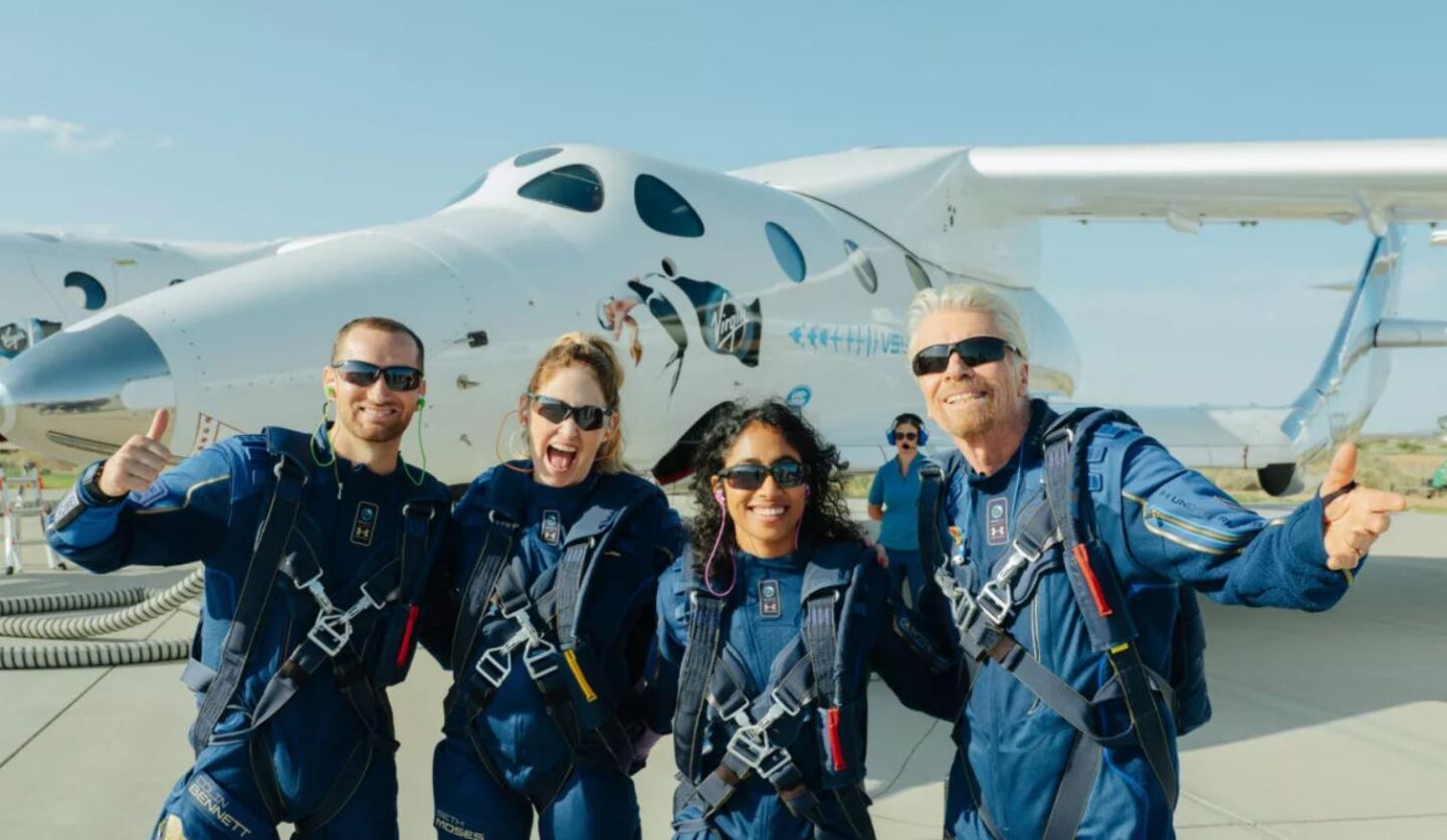 Sir Richard Branson (right) and fellow passengers