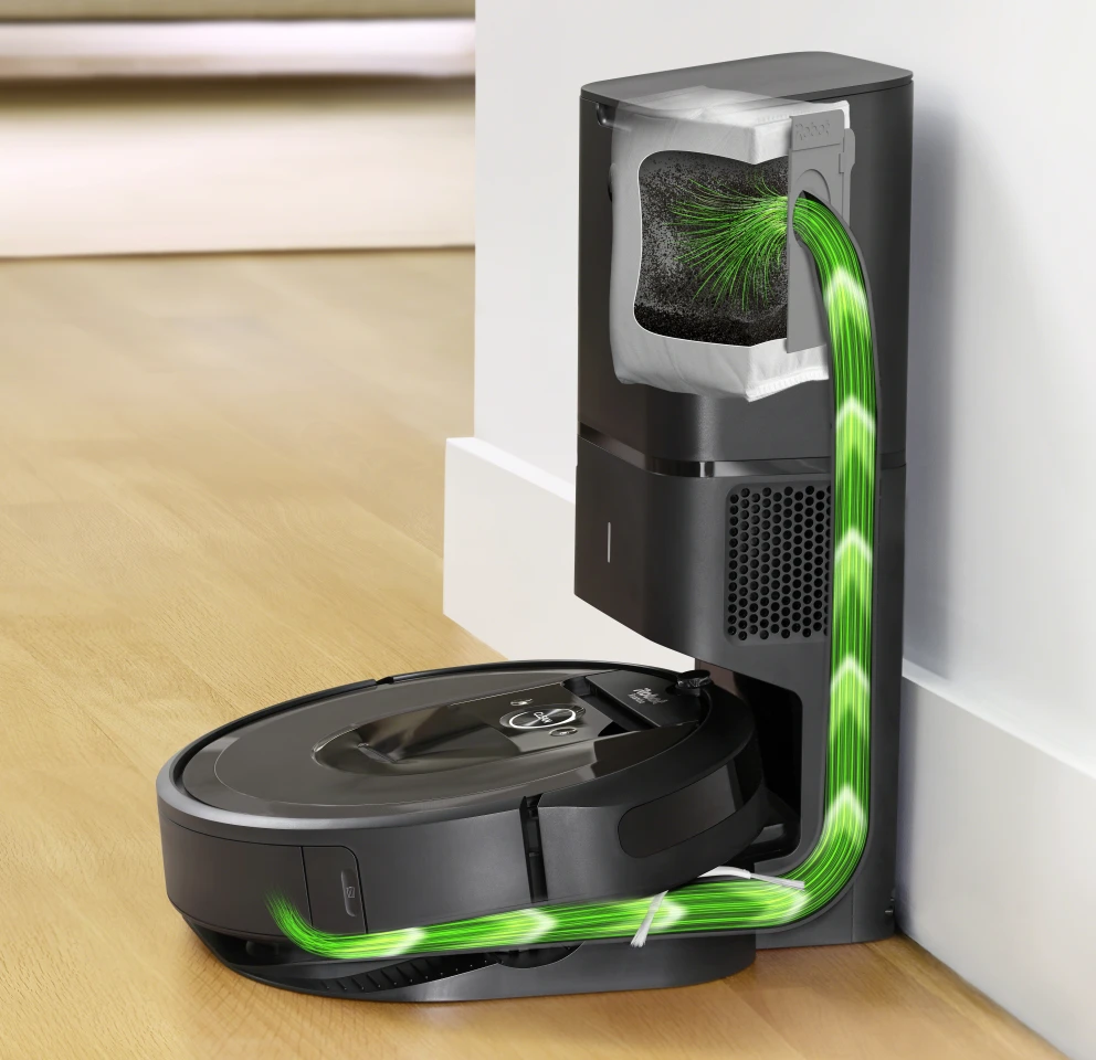 Waste is transferred from the Roomba i7 to the Clean Base Automatic Dirt Disposal unit using a vacuum