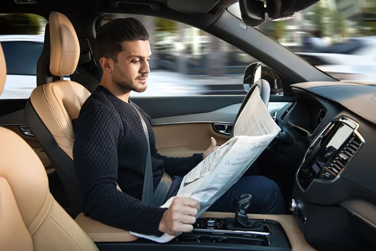 Will cars ever be smart enough that we can read the paper instead of the road while we're driving?