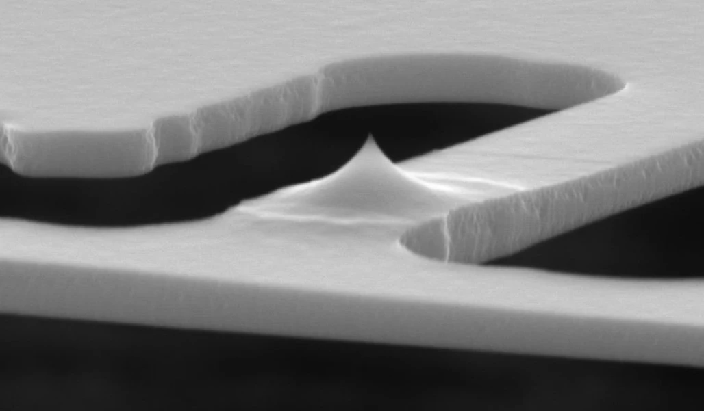 The heatable silicon tip is 100,000 times smaller than a sharpened pencil point