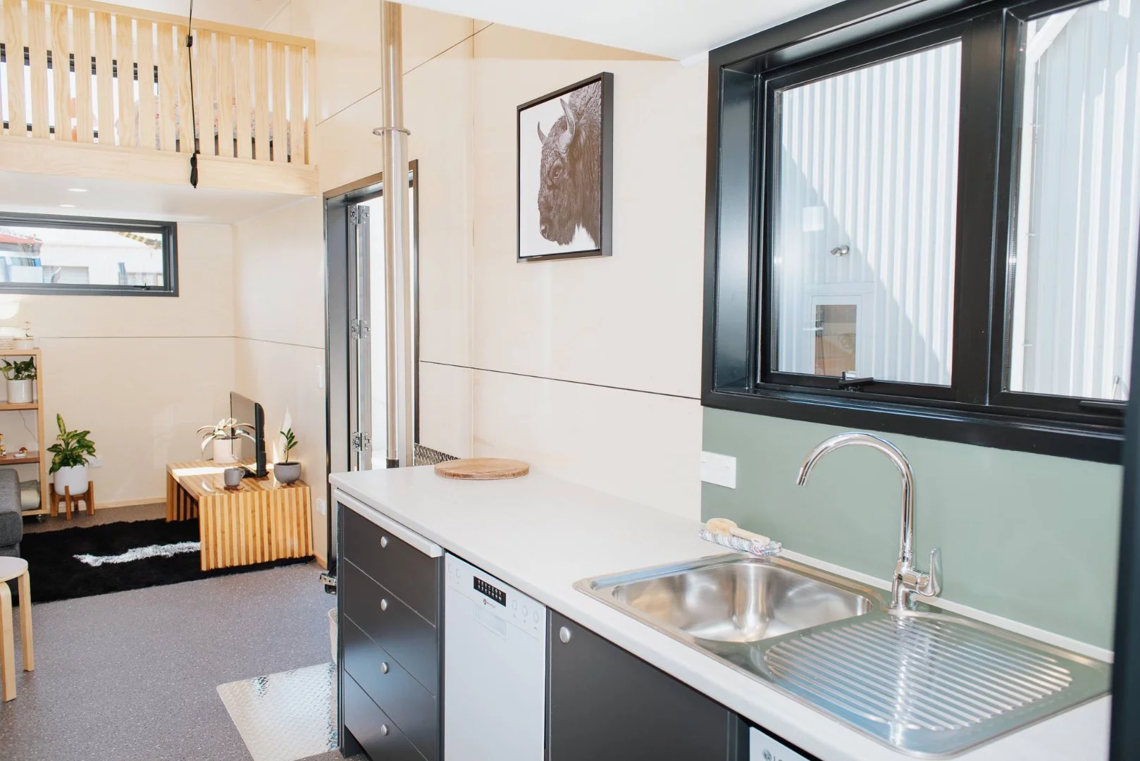 La Sombra Tiny House's kitchen also includes a dishwasher and quite a bit of cabinetry