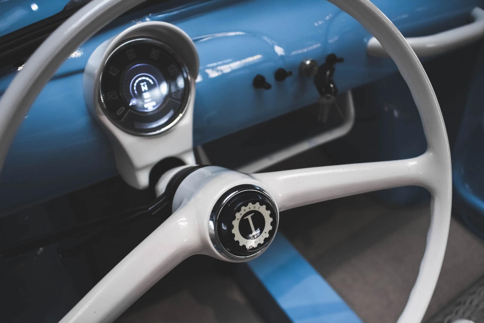 The dashboard is fitted with a five-inch digital screen and custom graphic interface