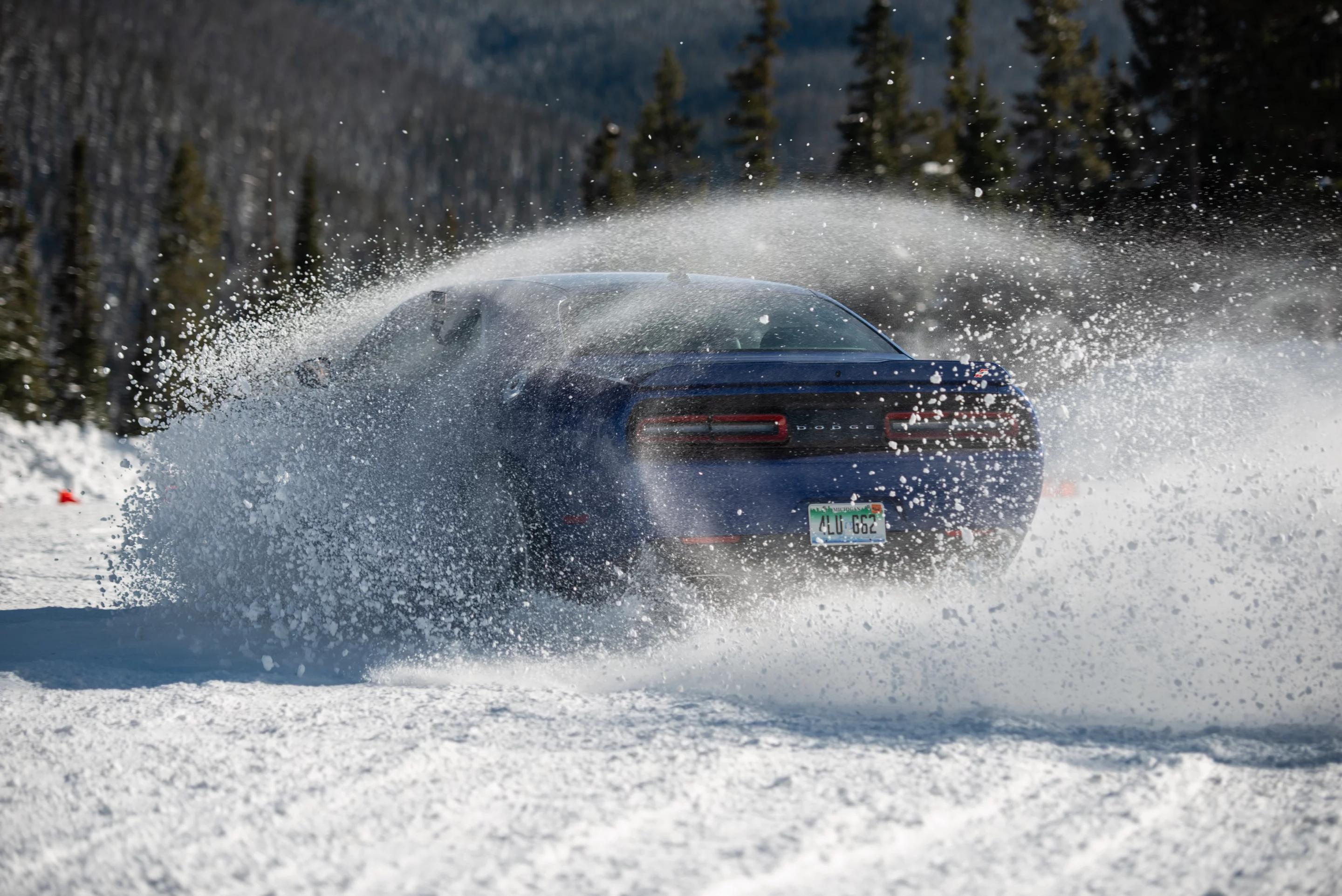 The Challenger GT throws rooster tails of snow, slides around like a ballet dancer in a Ken Block short, and makes wonderful muscle car sounds while doing so