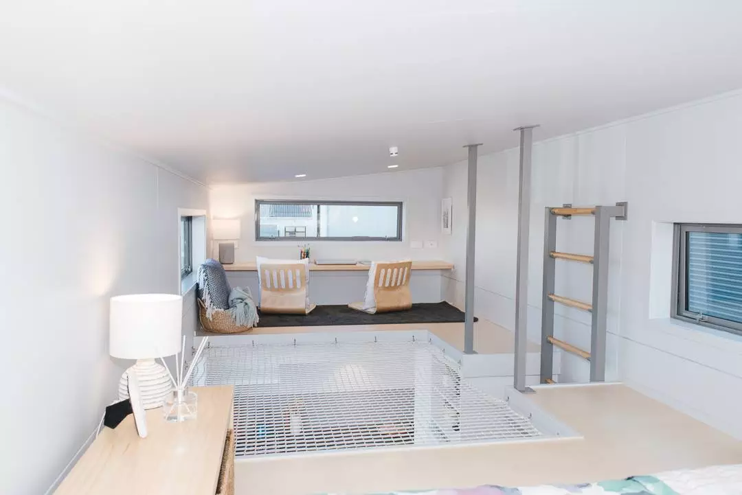 View towards the Larissa and Tyler Tiny House's office from the loft bedroom