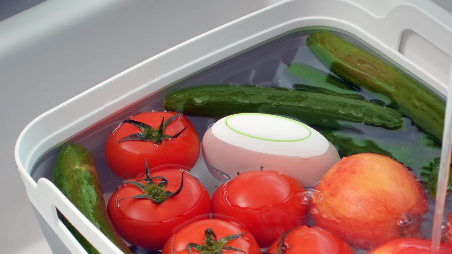 If the status light up top glows orange or red, more washing is required before the fruit and veggies are ready to eat. Then it's green for go !
