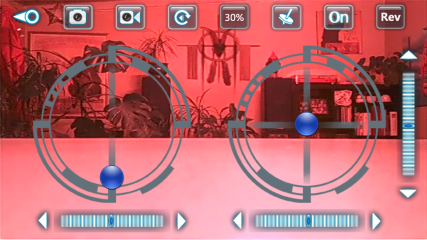 The Axis Drones mobile app provides flight controls on top of the camera feed. Low-light conditions skew colors.