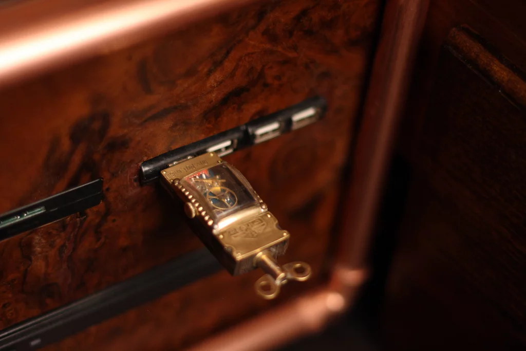 A Steampunk USB stick seated in one of the four USB 2.0 ports