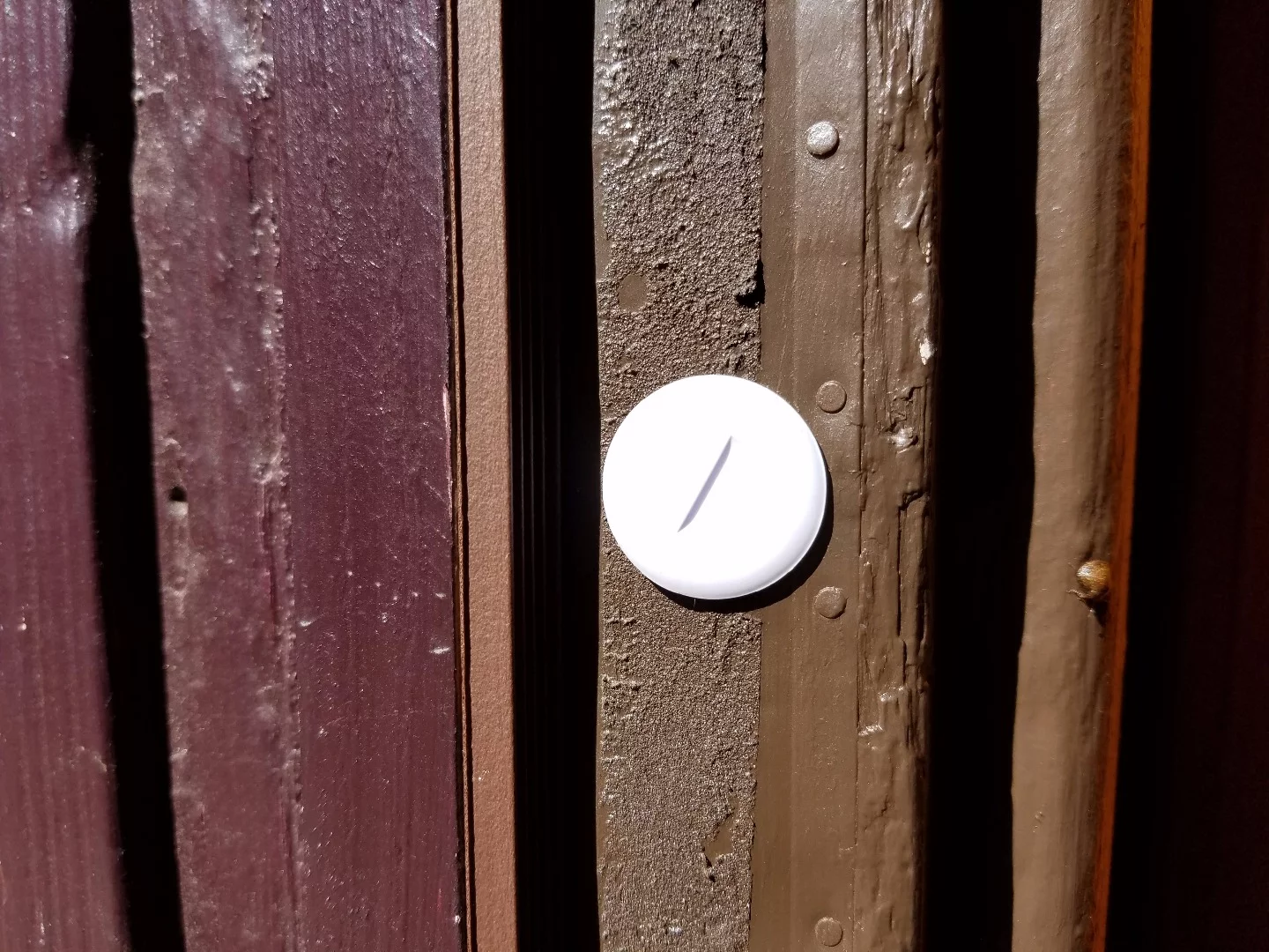 One of the recessed door sensors in the Vivint home security system