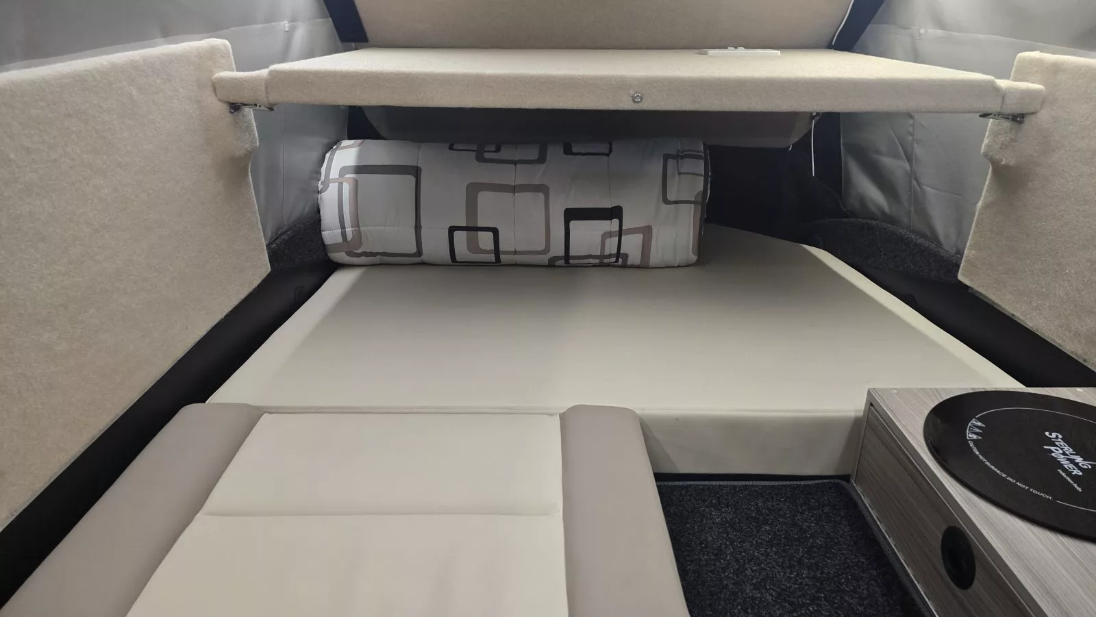 The single bed in the ECTS leaves some upper mattress space for a furry friend