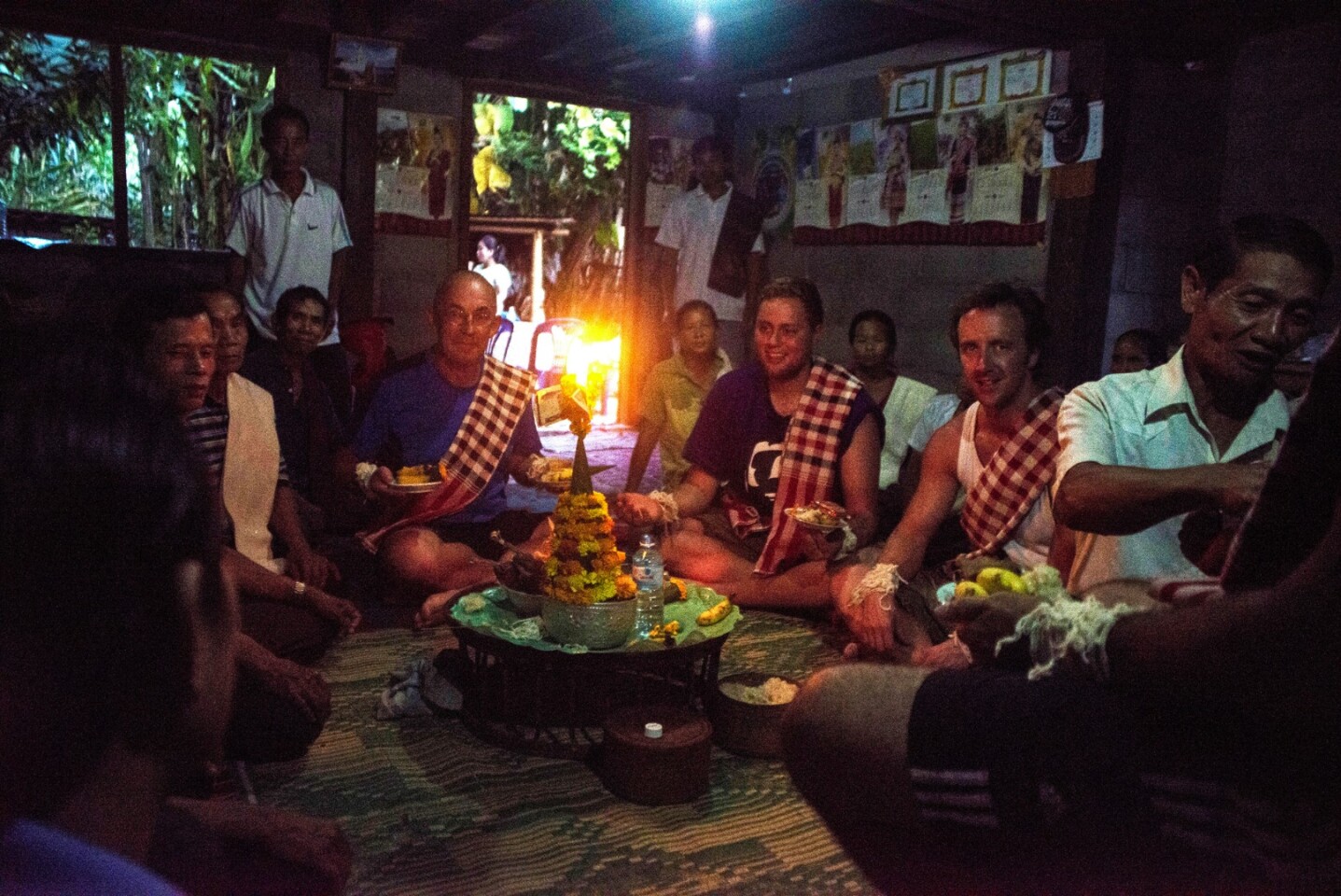 One of the three Baci ceremonies we experienced as we visited each village. These ceremonies are deeply heartfelt. Mike, Josh and Charlie being royally welcomed.