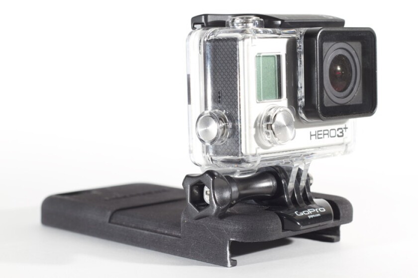 The camera quickly snaps in and out of a mounting point on the case