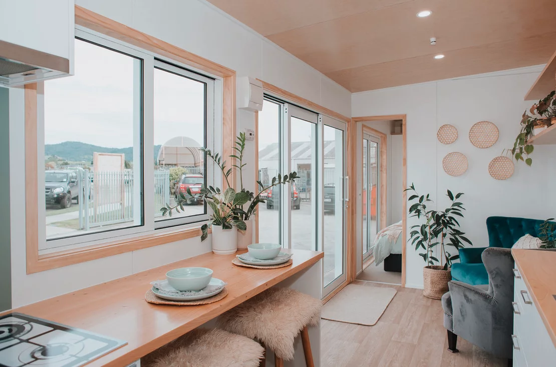 The Kōtuku's kitchen includes a breakfast bar with seating area for up to two people
