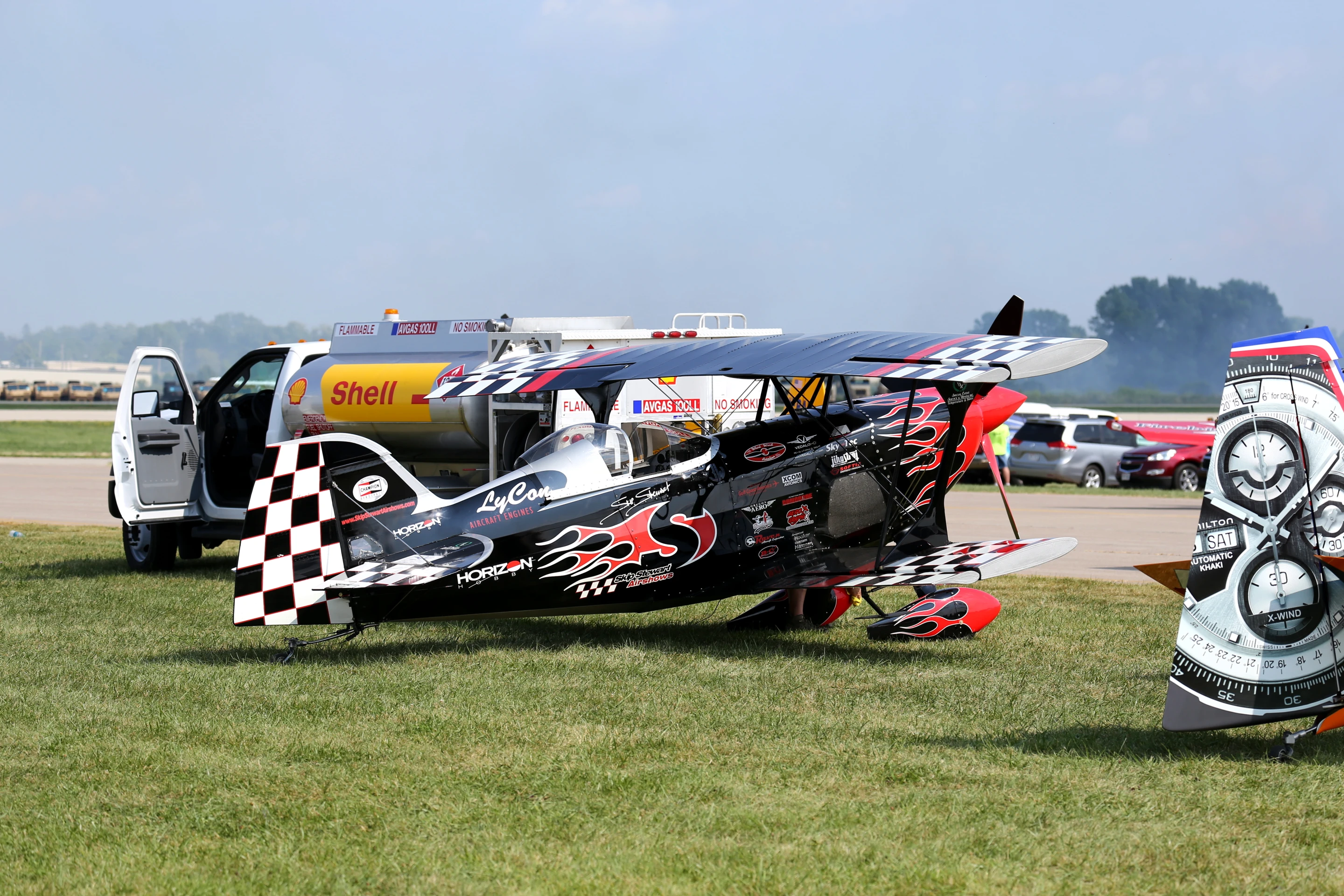 Aerobatic plane waiting on the edge of the tarmac (Photo: Angus MacKenzie/Gizmag.com)