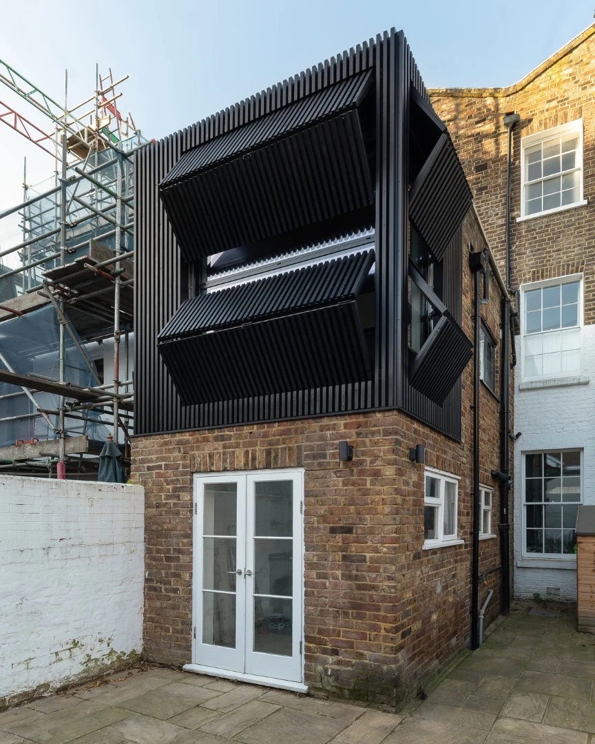 Black Box extends a Victorian-era terrace home