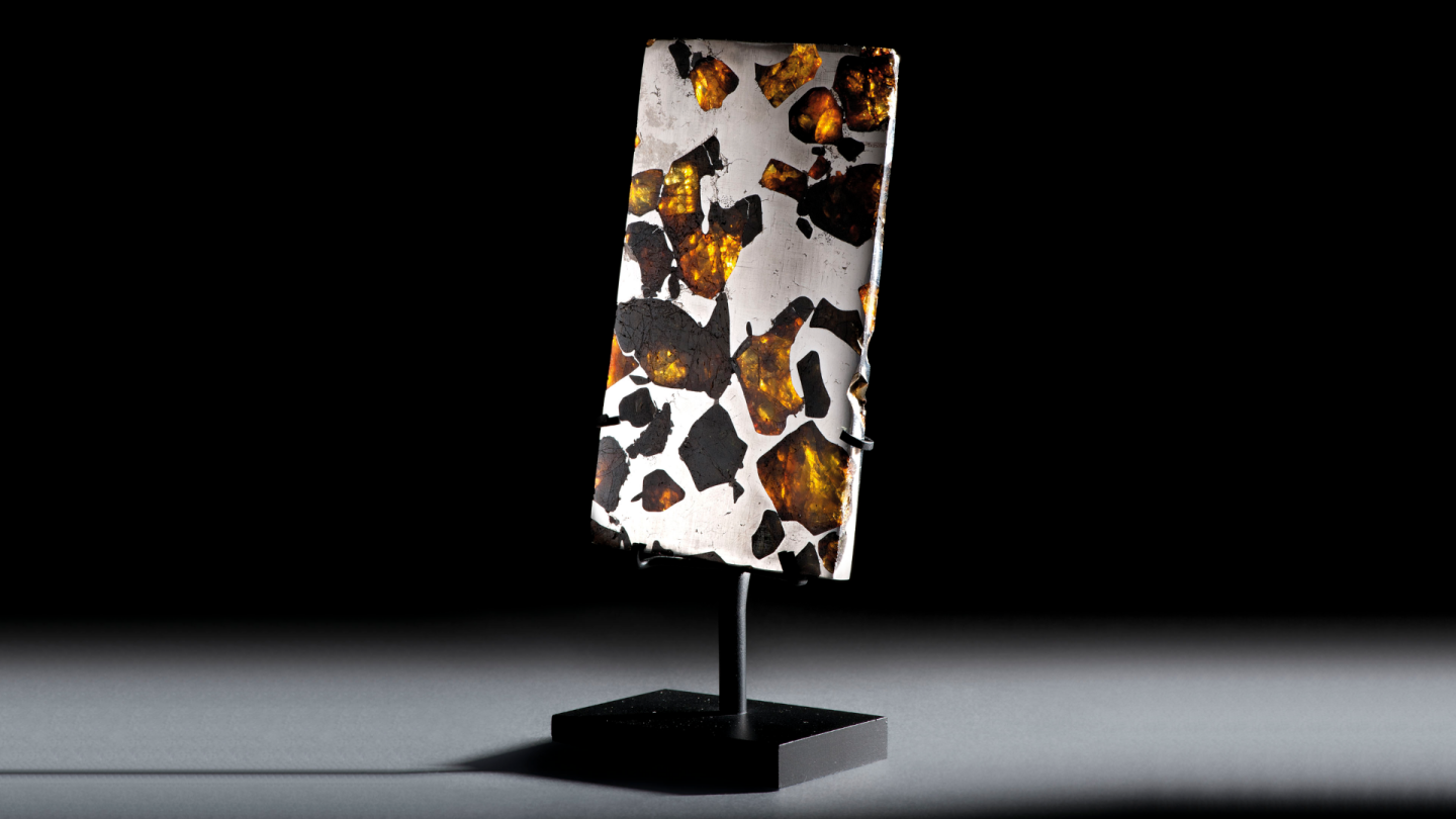Gemstones from outer space | Price: $6,348 (£5,000) | Auction Link | From the Fukang, in the Xinjiang Uyghur Autonomous Region (the home of the best known meteorite in history), this partial slice of a meteorite features a mosaic of sparkling olivine and peridot in a gleaming iron-nickel matrix, which has been polished to a mirror finish on both sides.