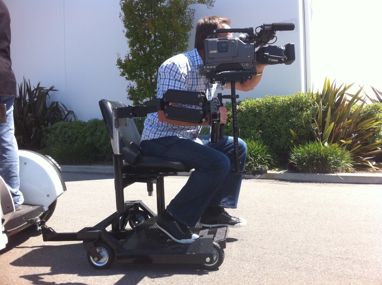 The T3-41 trailer is pulled behind a regular T3 electric standup vehicle