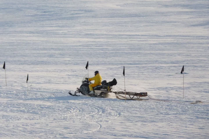 The purpose built "metal detector" being dragged behind a Ski-Doo