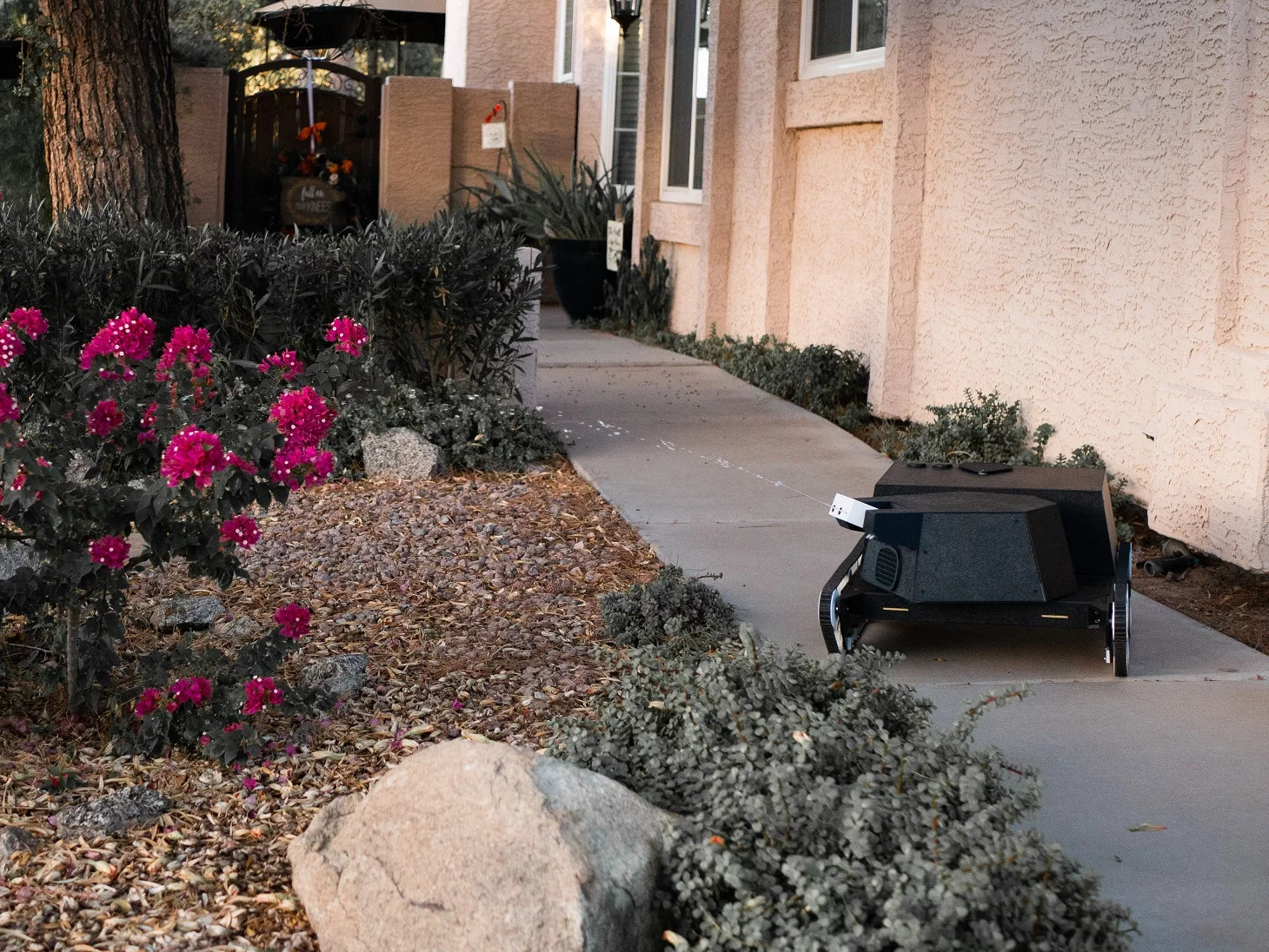 Yardroid waters a plant