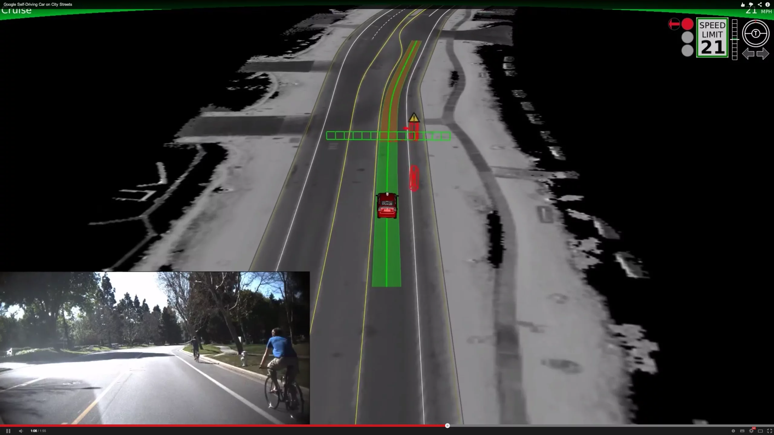Google's self driving car waits for a cyclist who is making a hand signal