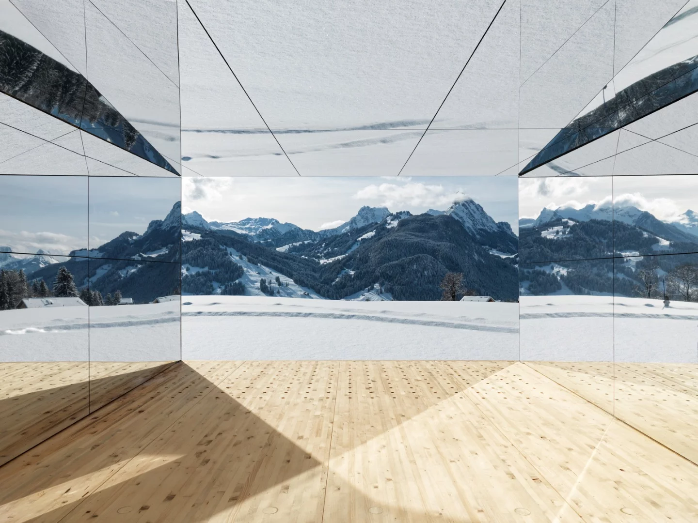 Mirage Gstaad's mirrored finish covers the entire exterior, and most of the interior, except for a wooden floor