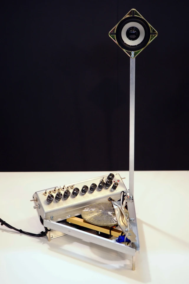 Ra uses a Raspberry Pi and Arduino Nano as its brains, and features a digital sound processor, stepper and servo motors, a 3 V mono sound system and a custom laser pickup/reader