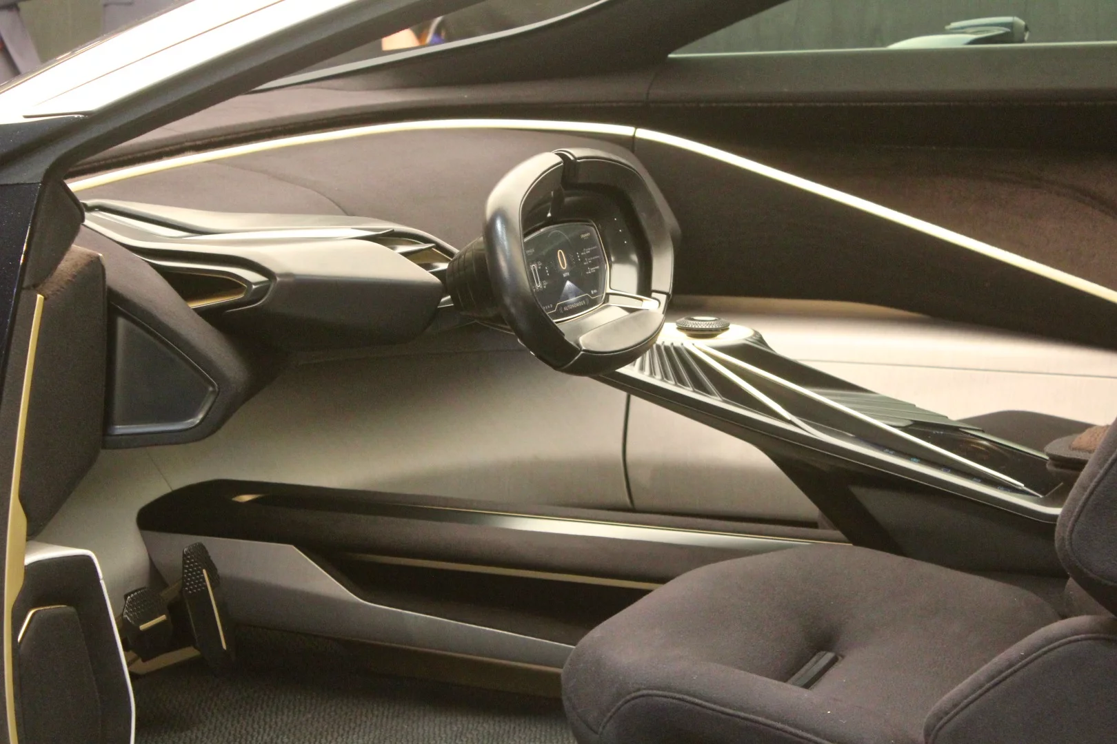 Inside, the new Aston Martin SUV conceptual has a swept-back sports car-like design language that is tempered by some more robust elements to the door sills and seating