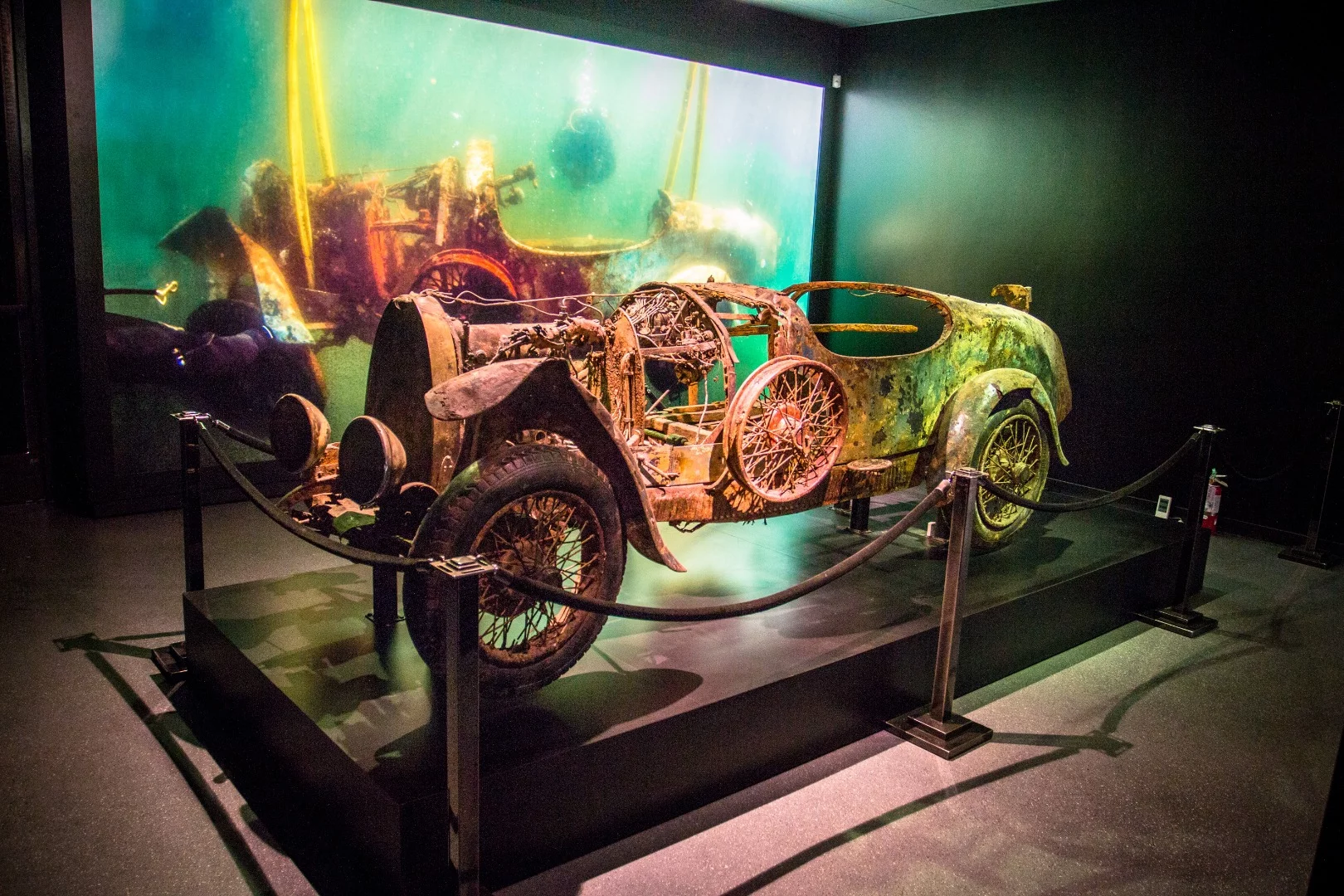 1925 Bugatti Type 22 Brescia Roadster: yes, it's got a little wet. This astonishing piece lived 173 feet down, at the bottom of Lake Maggiore on the border of Italy and Switzerland, for almost 75 years, becoming a bit of a local legend to folk who couldn't believe such a priceless car could possibly be down there. It had been deliberately dropped there by the Swiss police when its driver, playboy Adalbert Bode, had tried to cross the border without bringing any cash to pay customs on it. No taxes, no car, he was told, and he abandoned the car there for the police to deal with it.