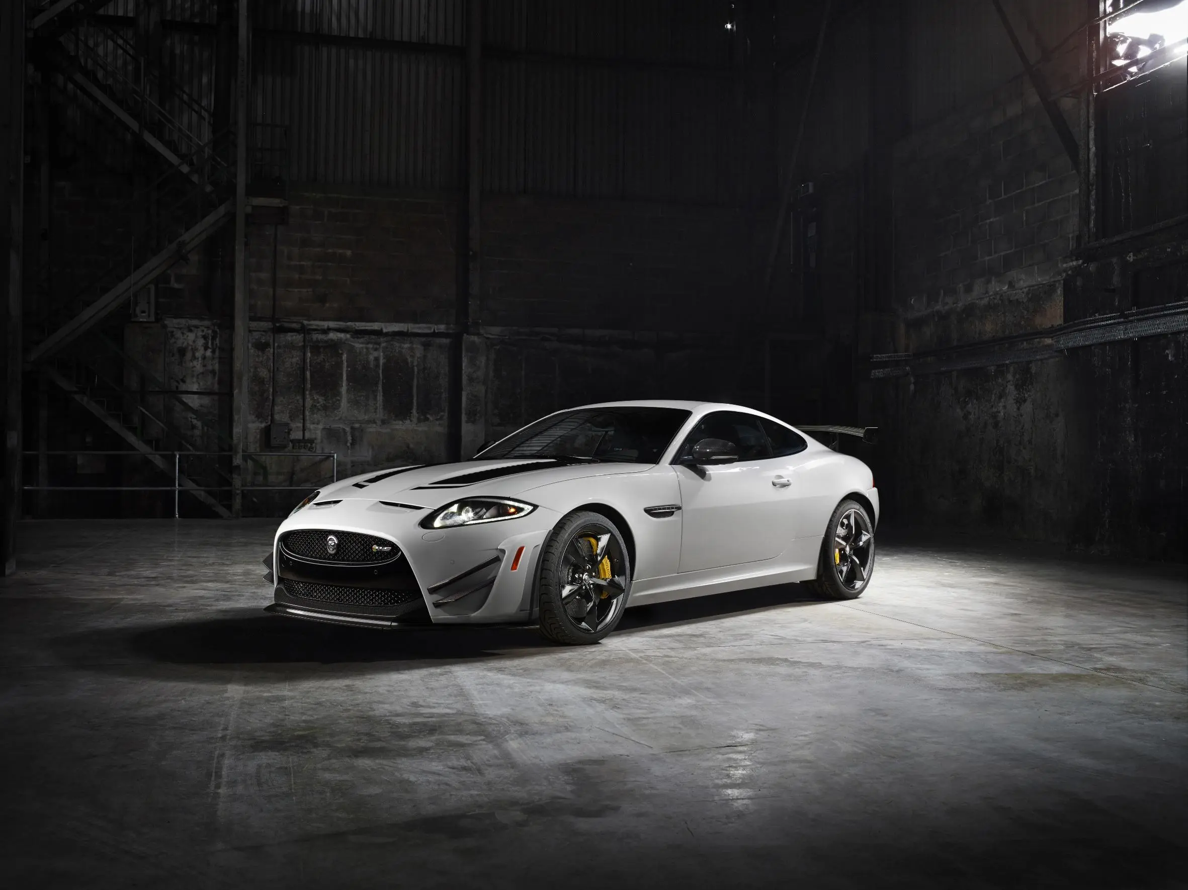 GT has new carbon-fiber front splitter, dive planes, exaggerated wheel-arch spats, rear diffuser treatment and aluminum valance