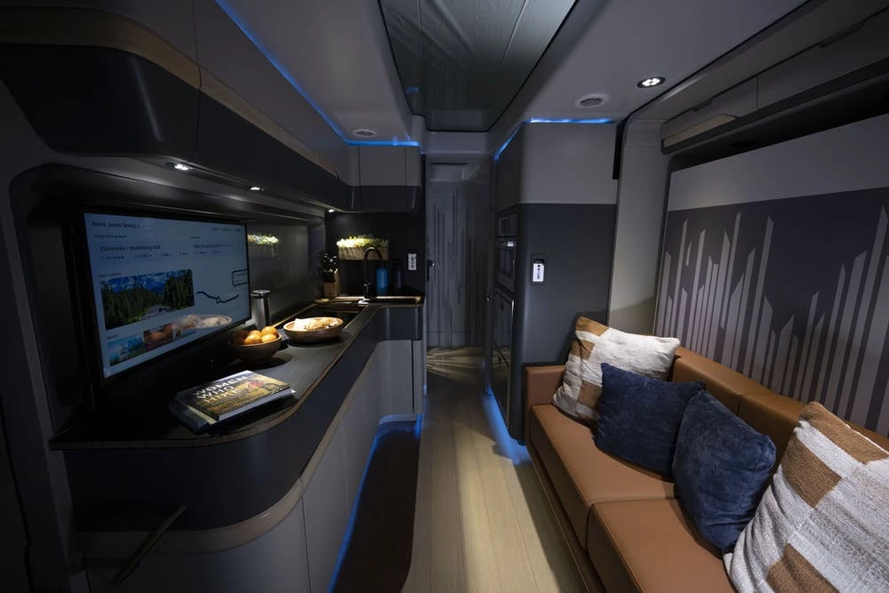 Thor keeps Vision Vehicle width streamlined by installing the sofa into a slide-out wall, which compacts down during driving but creates plenty of space at camp