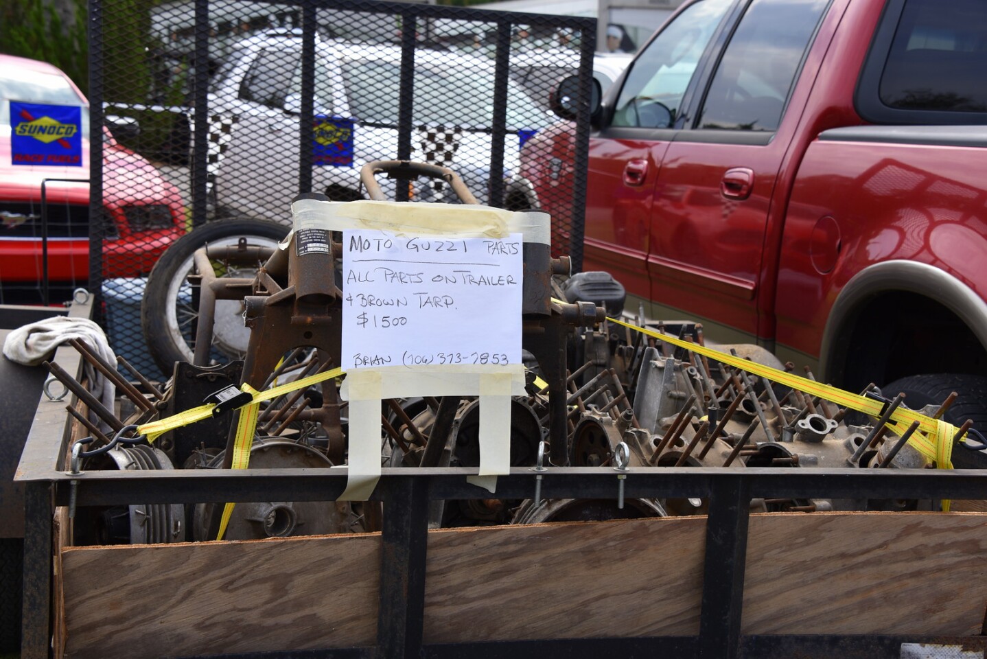 Need a couple lifetimes worth of Moto Guzzi parts? Here you go! (brown tarp included).