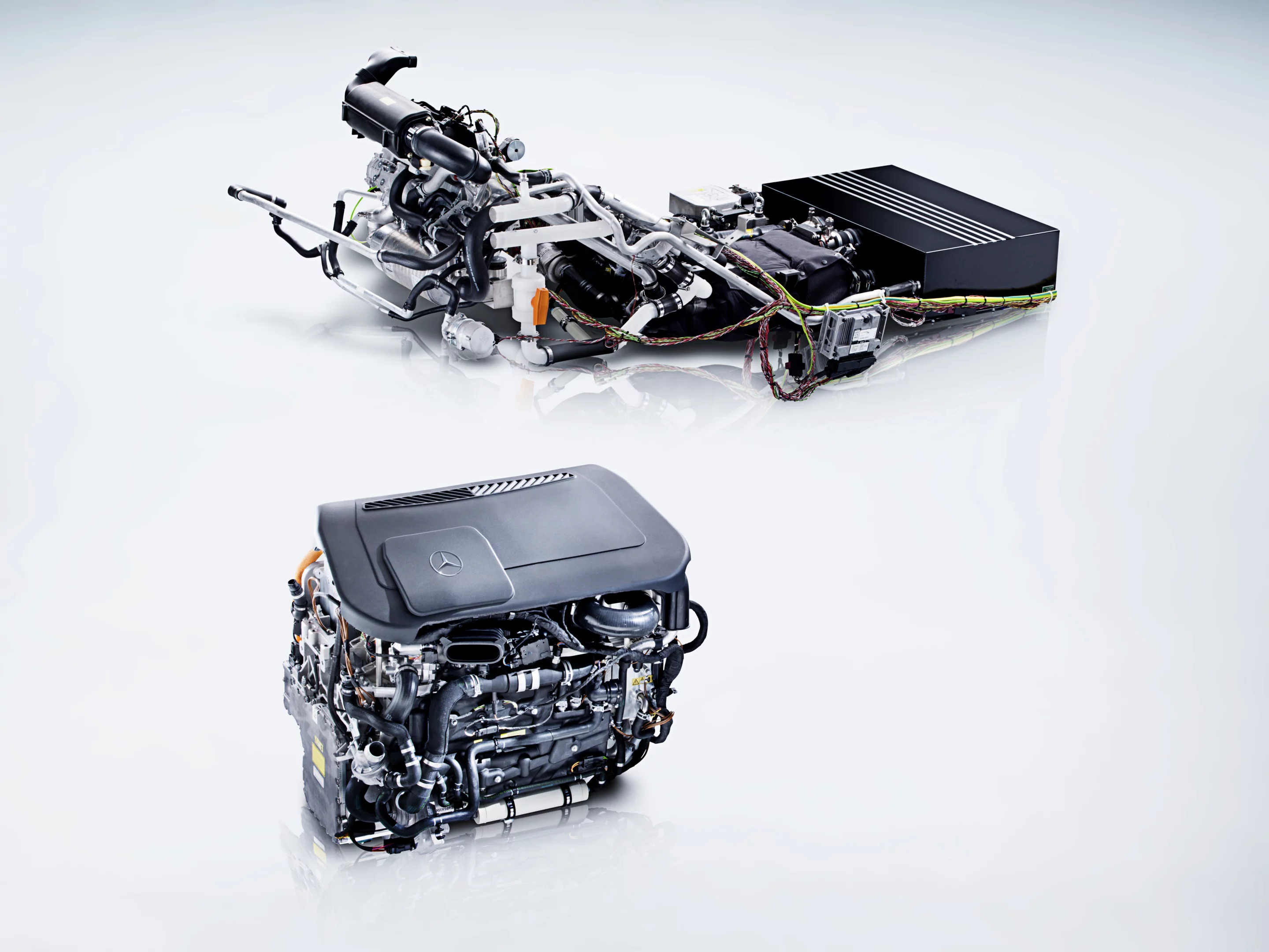 The fuel cell system of the Mercedes-Benz B-Class F-CELL (above) compared to the current development status