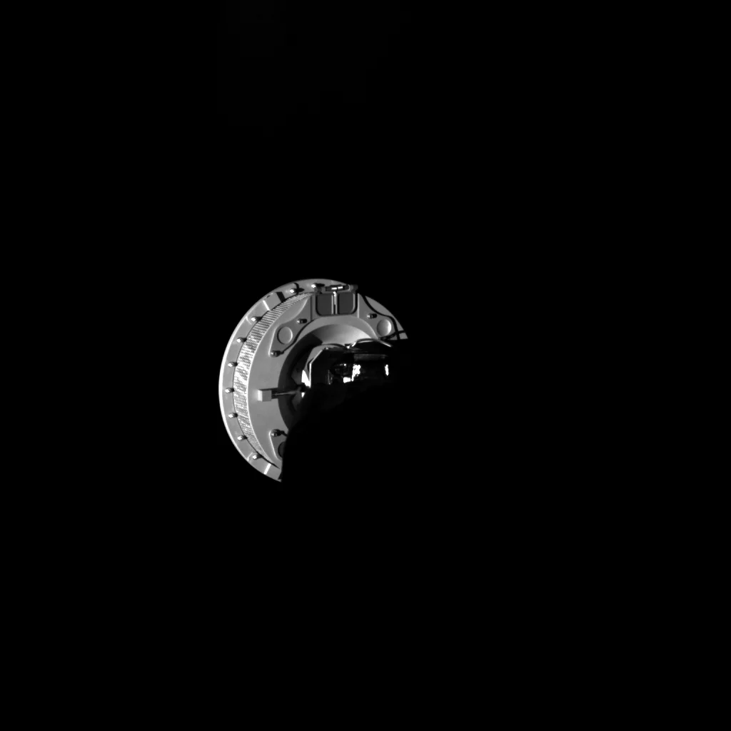 The OSIRIS-REx's TAGSAM arm imaged extending into space