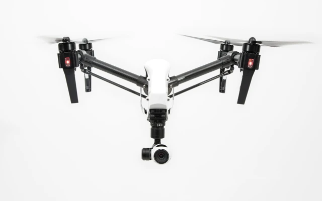 The DJI Inspire 1, with its landing gear and prop arms raised for flight