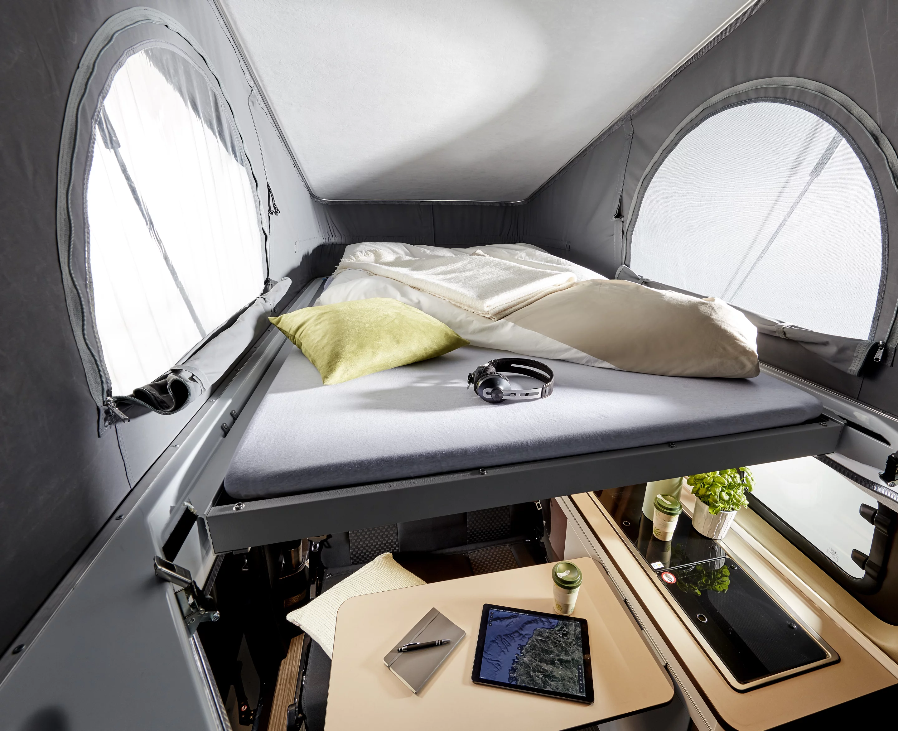 The pop-up roof and roof bed come standard