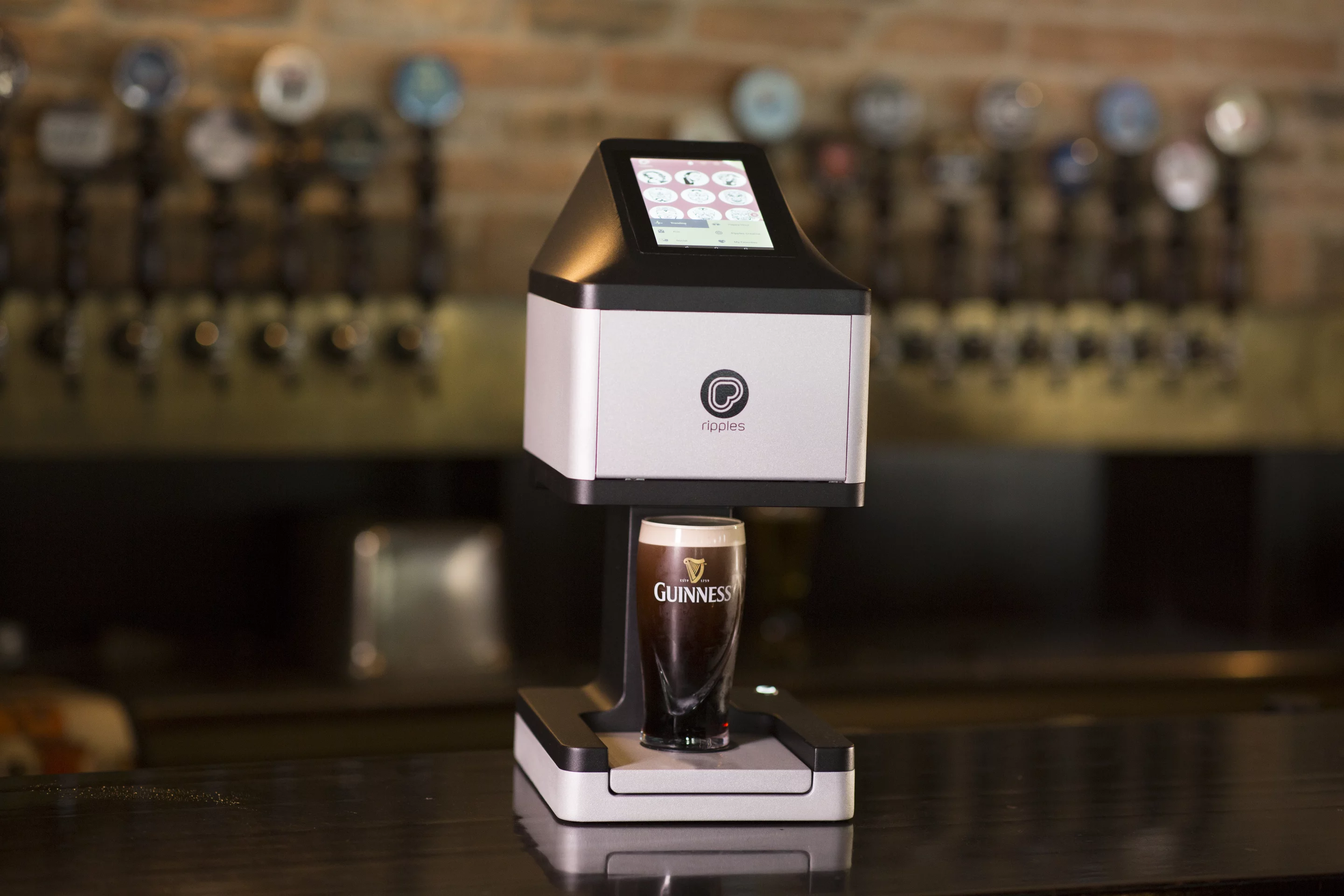 Beer Ripples works with glasses up to 7 inches tall (18 cm), raising them up to its print head and then taking 11 seconds to print any message or image on the beer foam