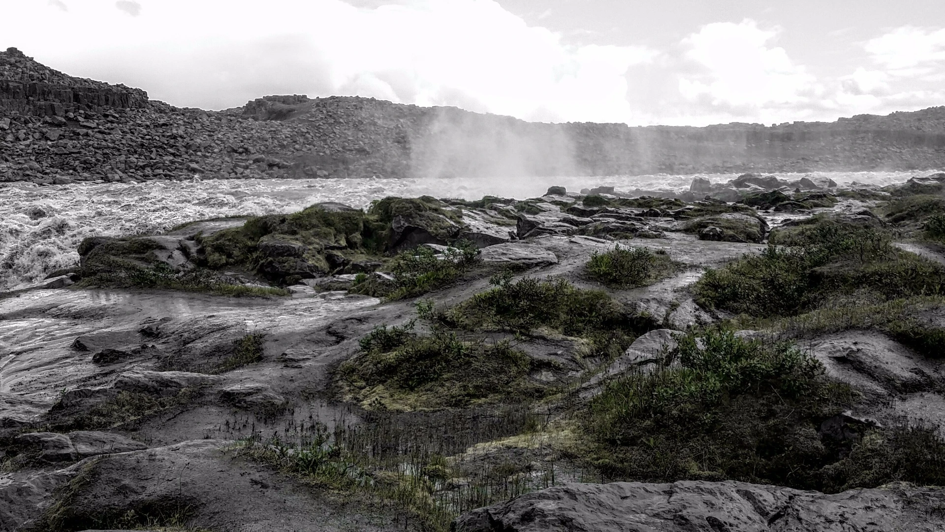 While Iceland has plenty of areas where steam shoots from the ground, this particular patch of mist comes from the churning water just before Dettifloss, Europe's highest-volume waterfall. Five hundred cubic meters of water per second (17,657 cubic ft) plunge 45 m (148 ft) downward after tumbling over the edge. Dettifoss is 100 m (328 ft) wide and was once considered being harnessed for a hydroelectric plant. The plans were scrapped when it was found that the volcanic rock through which it flows was too porous to create the needed reservoir.