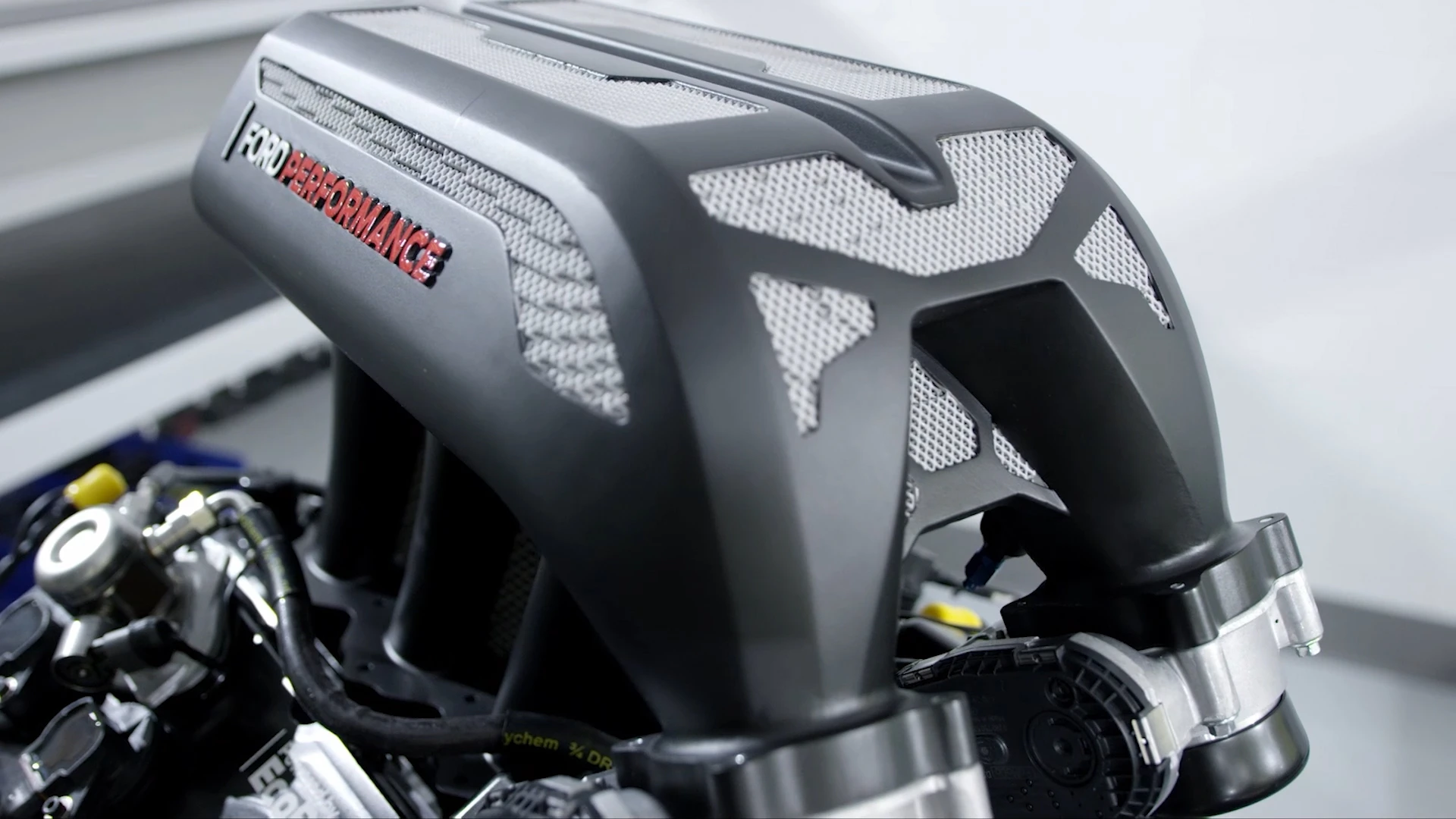The 3D-printed aluminum intake manifold of the "Hoonitruck"