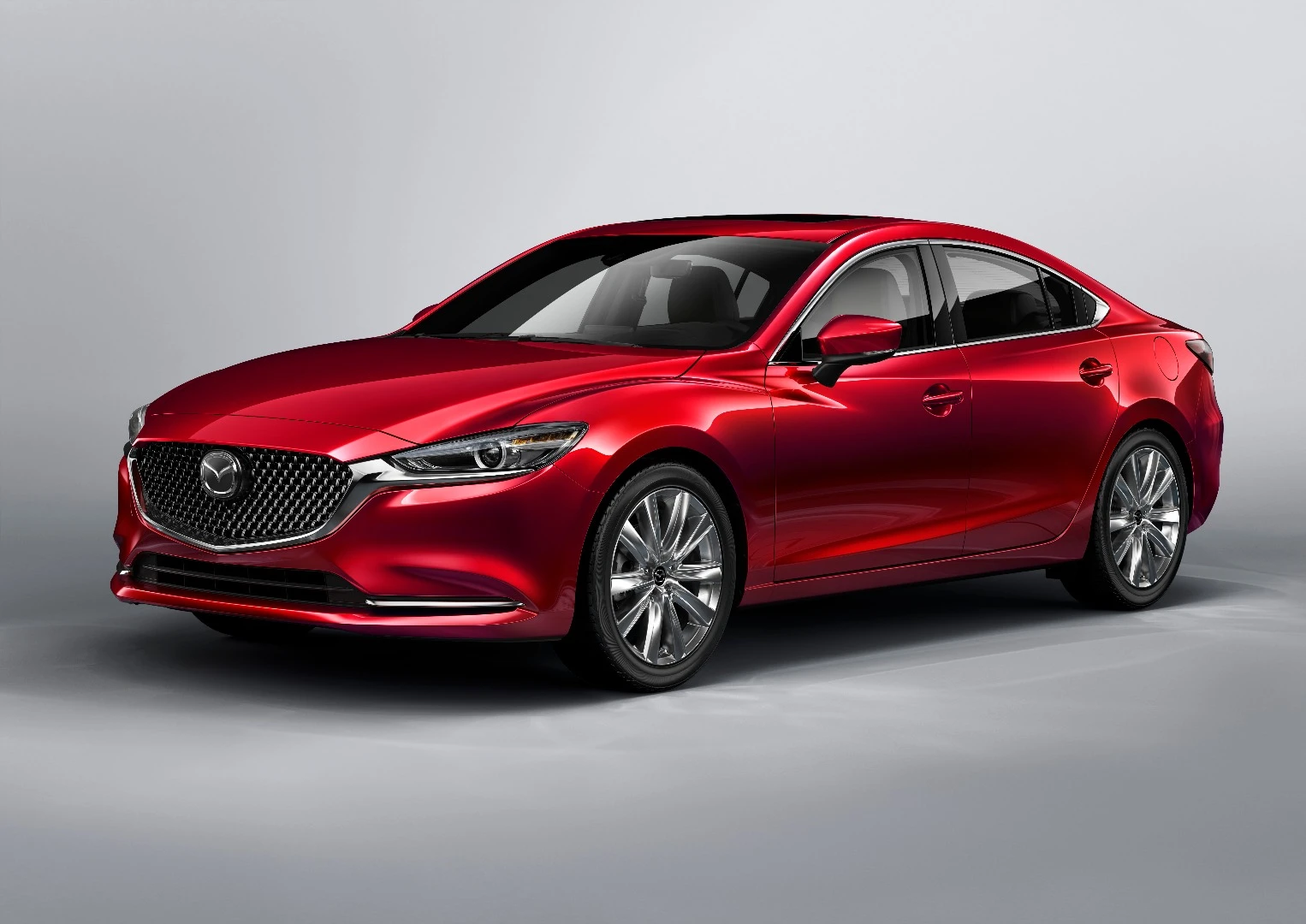 The new Mazda 6 ditches the horizontal-slat grille for a much more macho wire-mesh grille