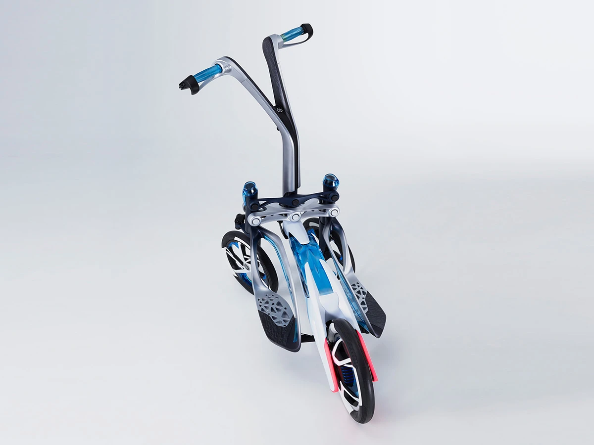 Tilting is engaged through a locking mechanism on the steering tube of the Tritown