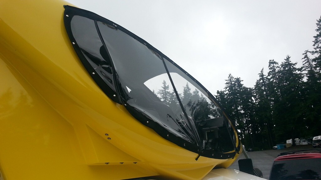 Vinyl side doors add some protection from splashing
