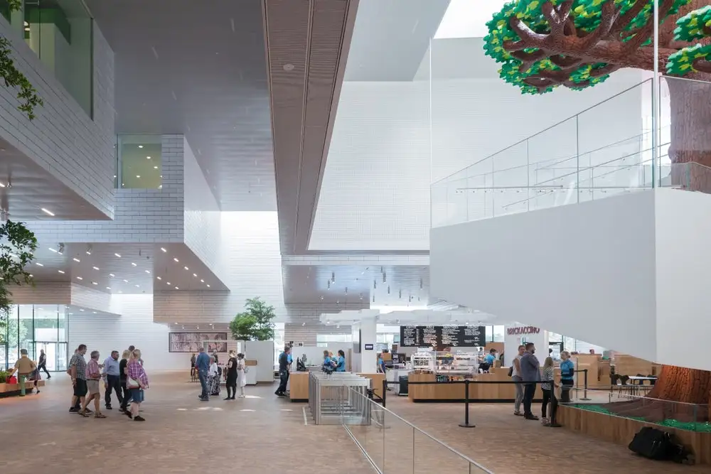 The Lego House's large central square is open to the public, allowing visitors and locals to take a shortcut through the building