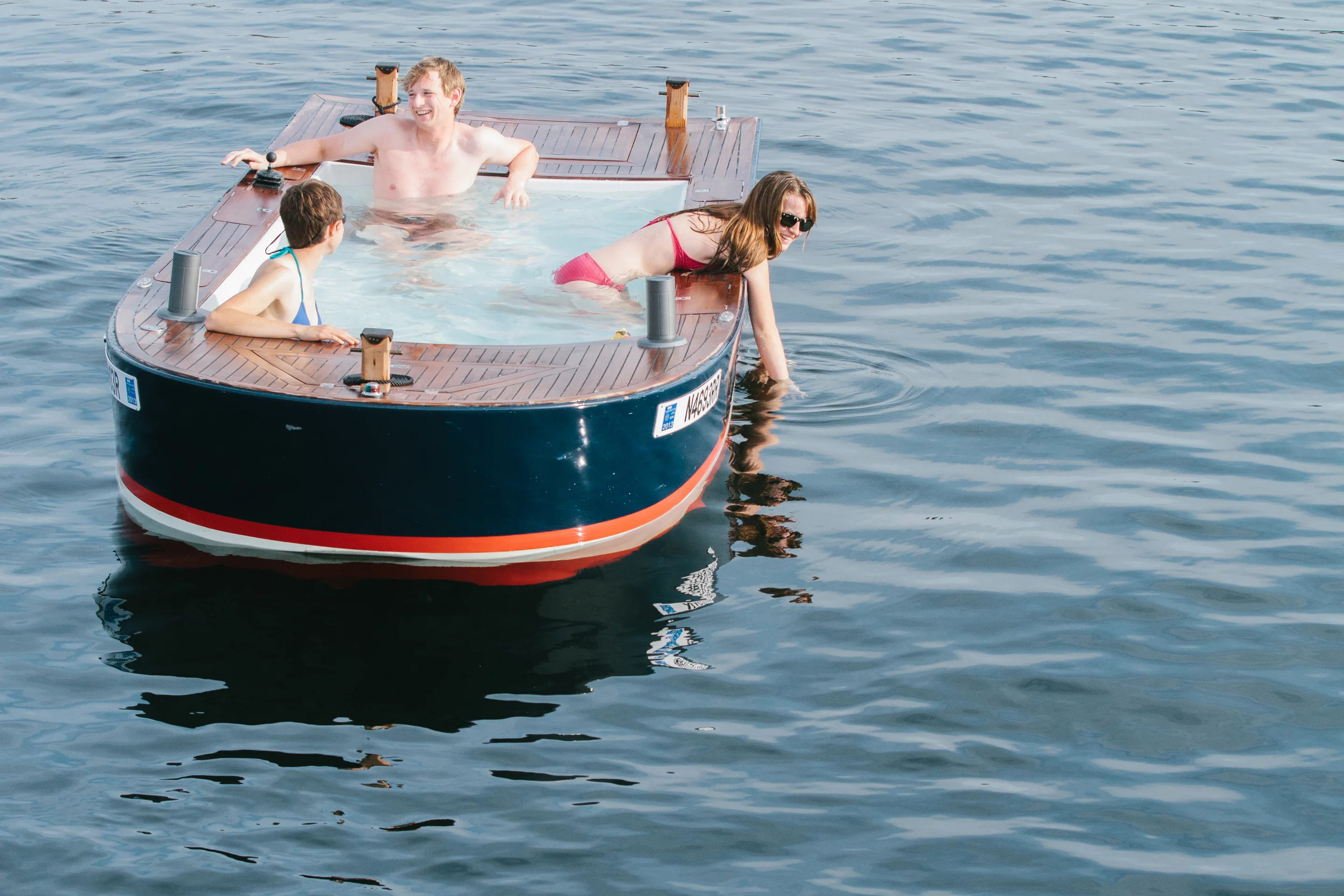 The Hot Tub Boat allows its passengers to soak while they cruise
