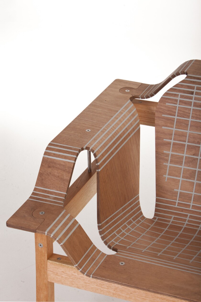 The plywood is scored and the gaps filled with flexible polymer, meaning the wood can be bent and shaped as needed