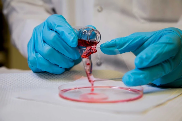 Applied to a pane of glass, the new omniphobic coating easily shakes off a shower of hexadecane oil