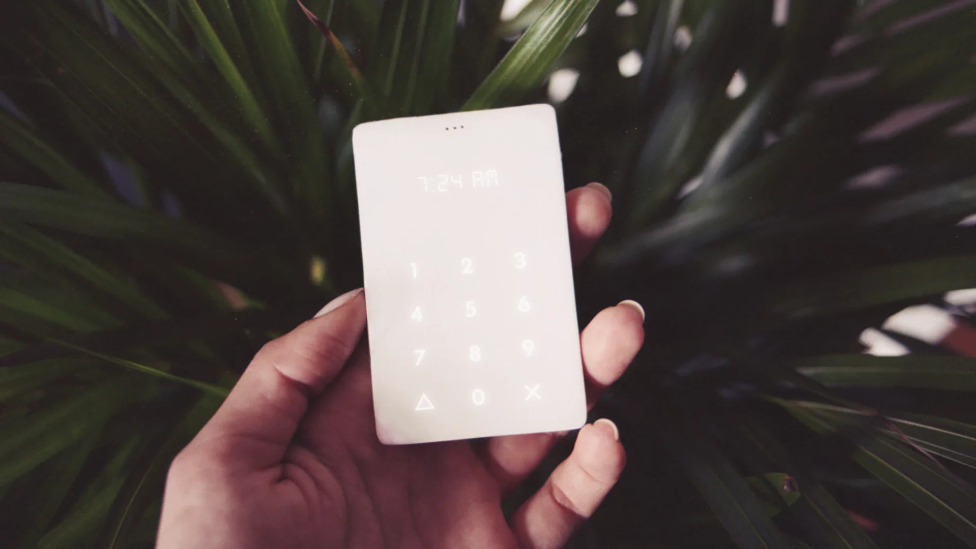 The product is essentially a GSM cell phone with 500 pre-paid minutes that links to the user's smartphone to provide call forwarding