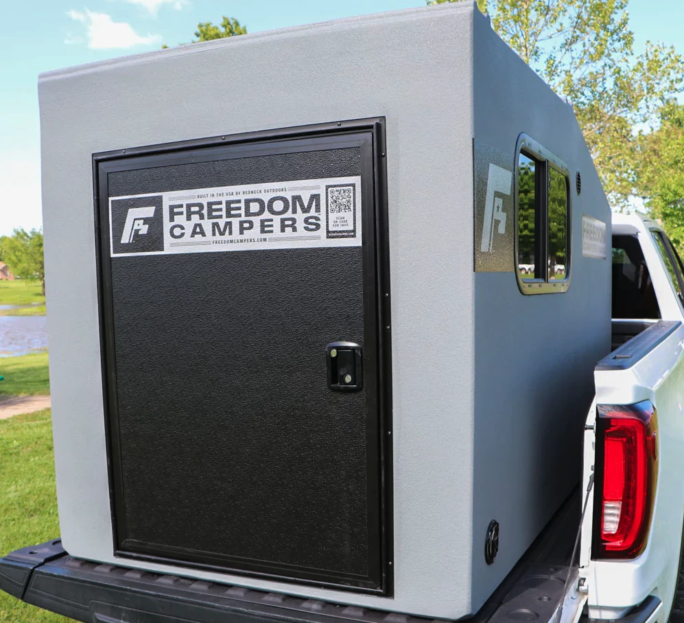 The extra space between the Freedom pod and pickup rails exists on the 48-in version that fits between the wheel wells of full-size and some smaller trucks
