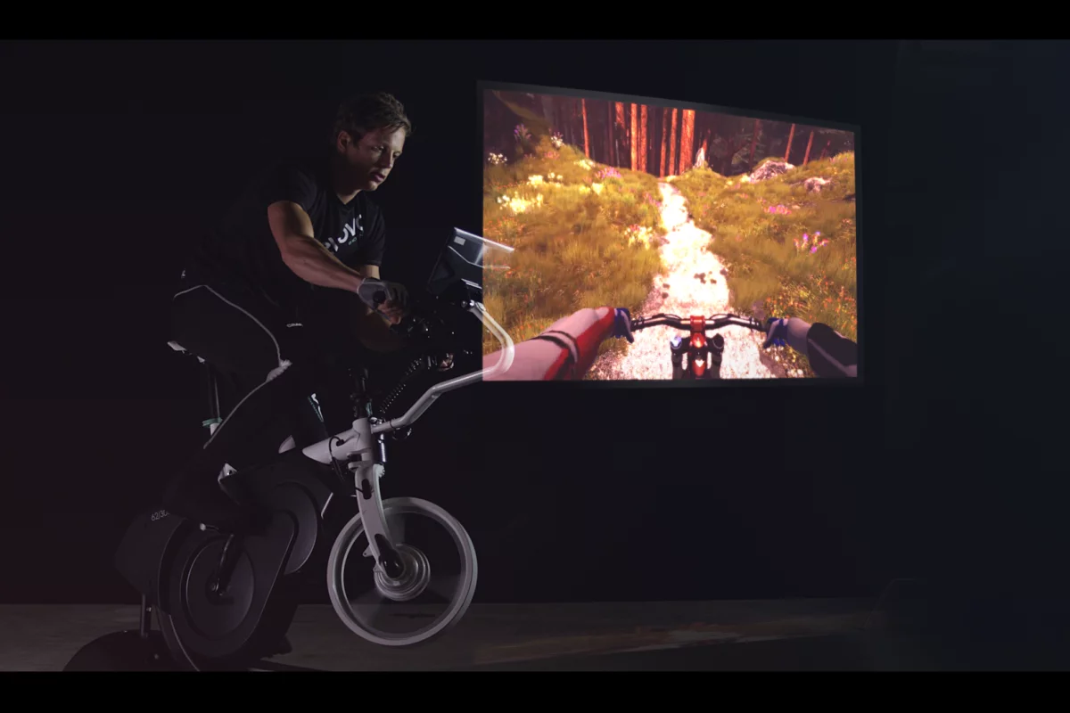 The ebove trainer both affects and reacts to an animated trail display, which the user views on an attached tablet or even a VR headset